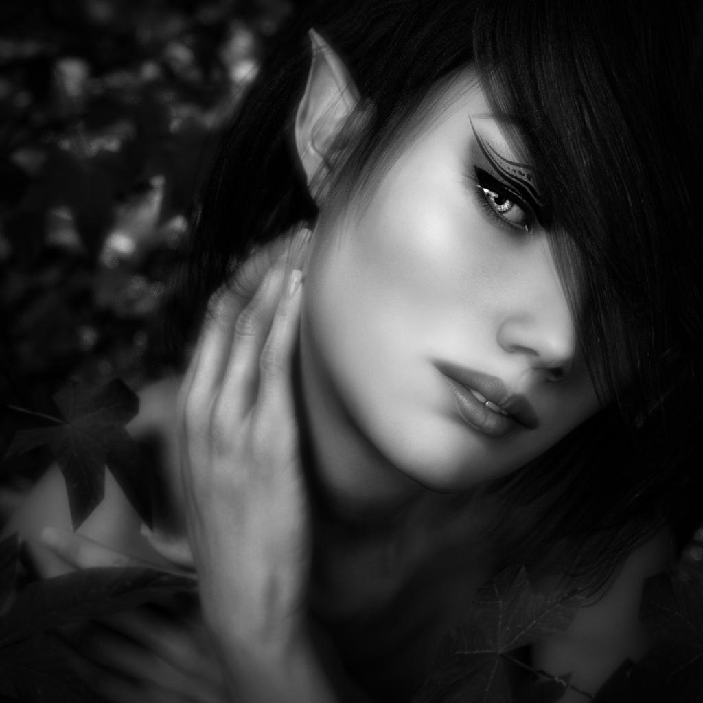 Balck and White portrait of a woodland elf amongst leaves.